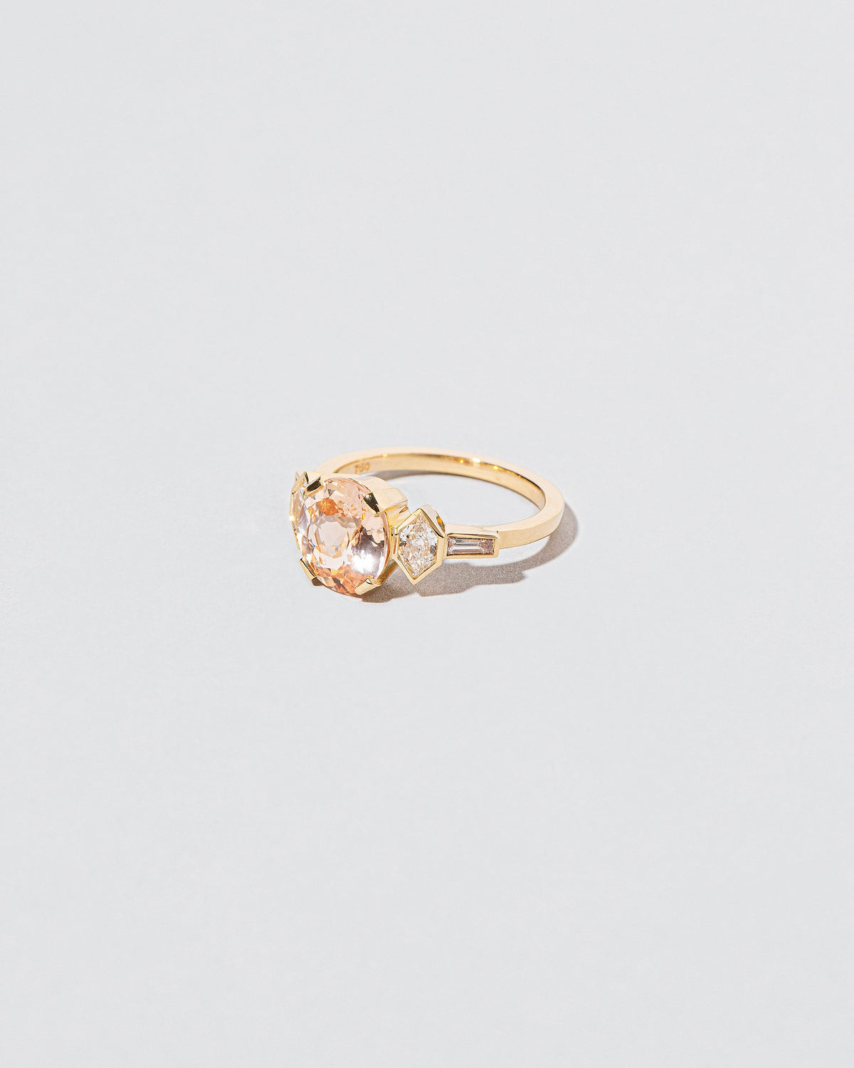  Qualia Ring on light color background.
