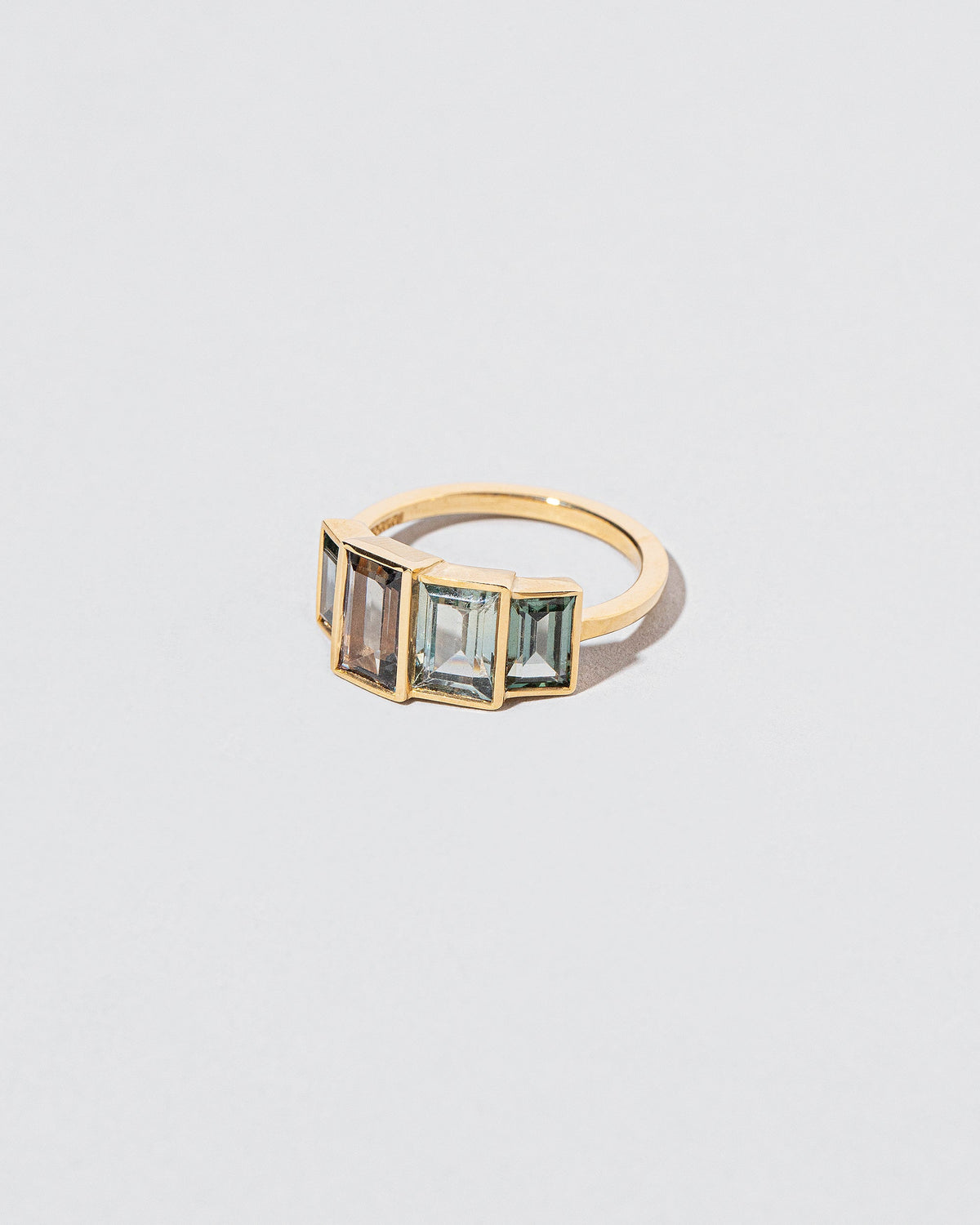 View from the side of the Nile Ring on light color background.