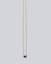Reef Necklace on light colored background.