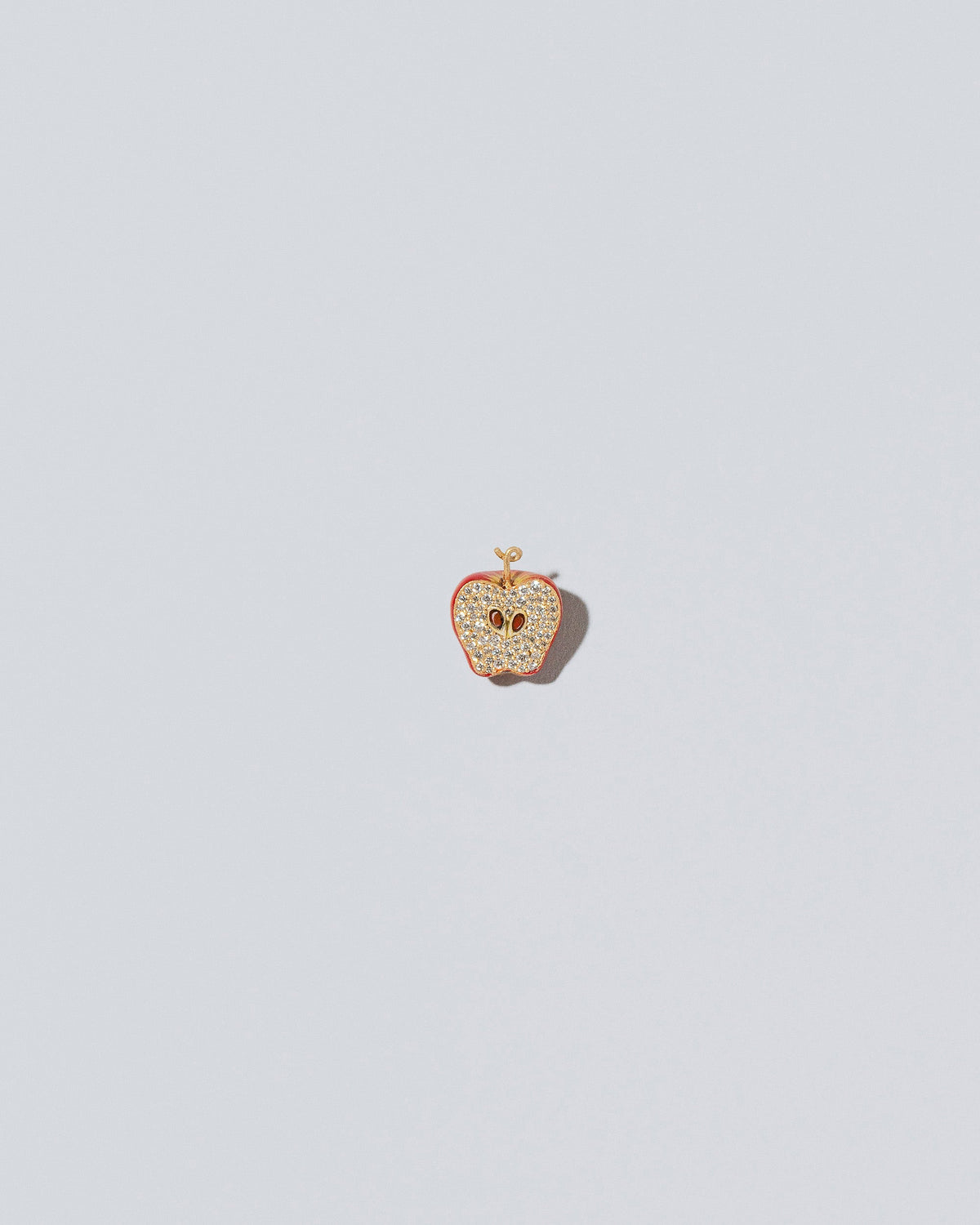 Red Apple Charm - Fulls on light color background.