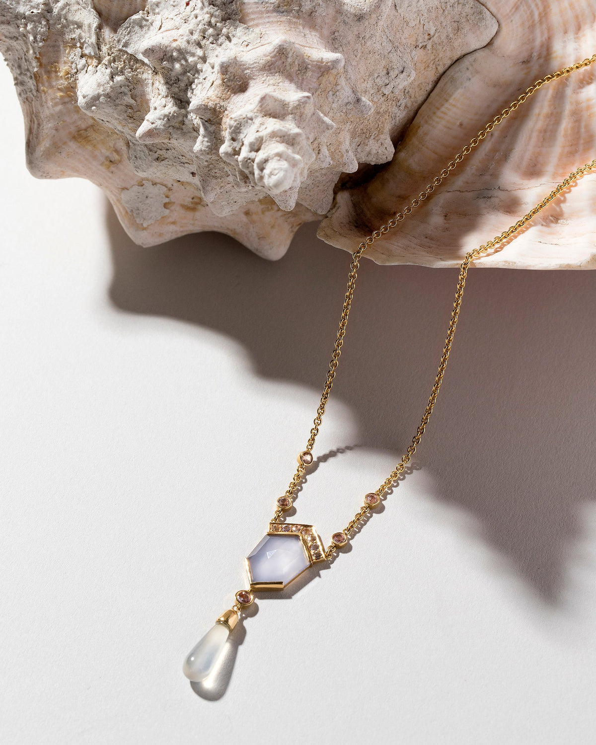  Blue Chalcedony Kite Necklace on light color background.