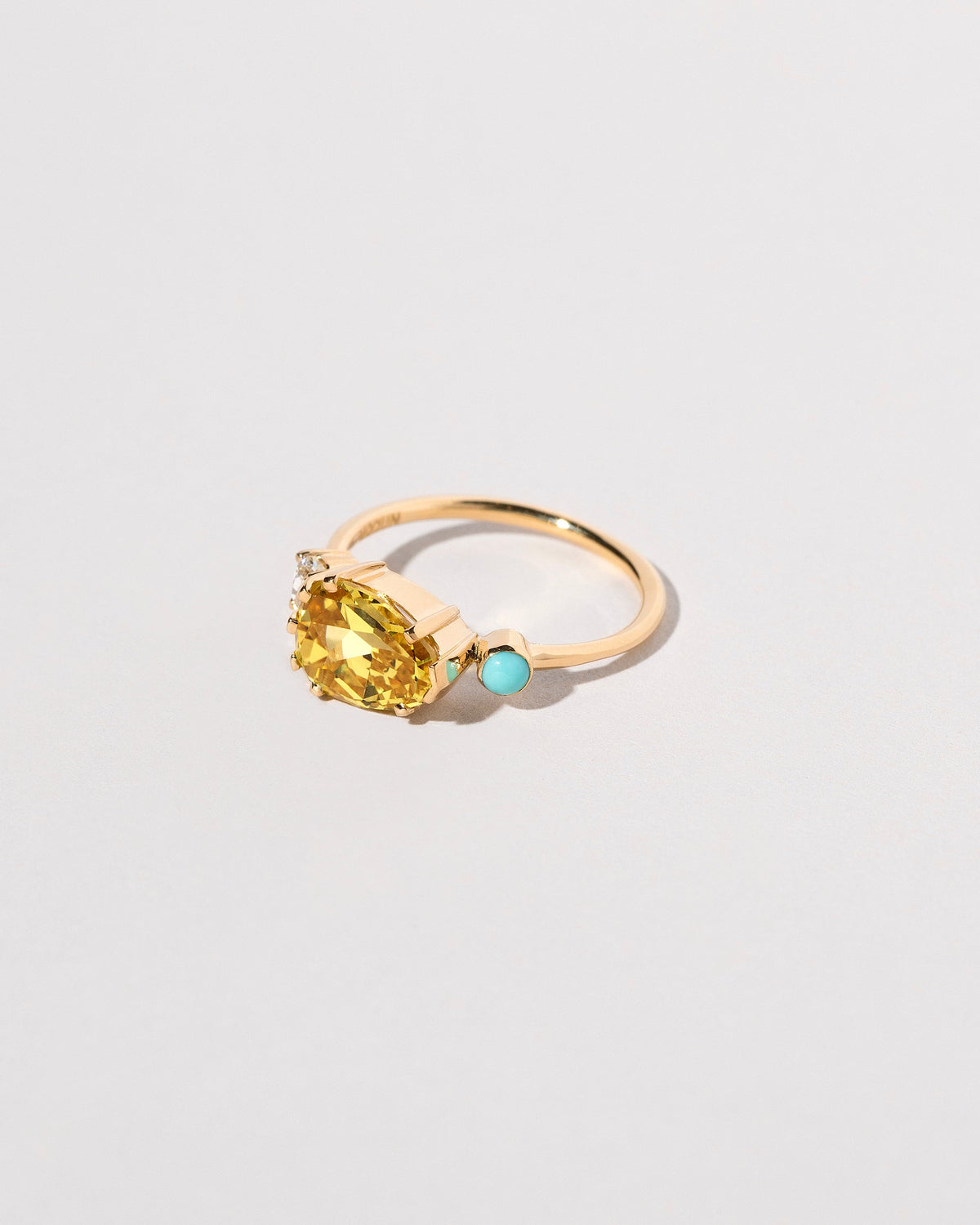  Buttercup Ring on light color background.