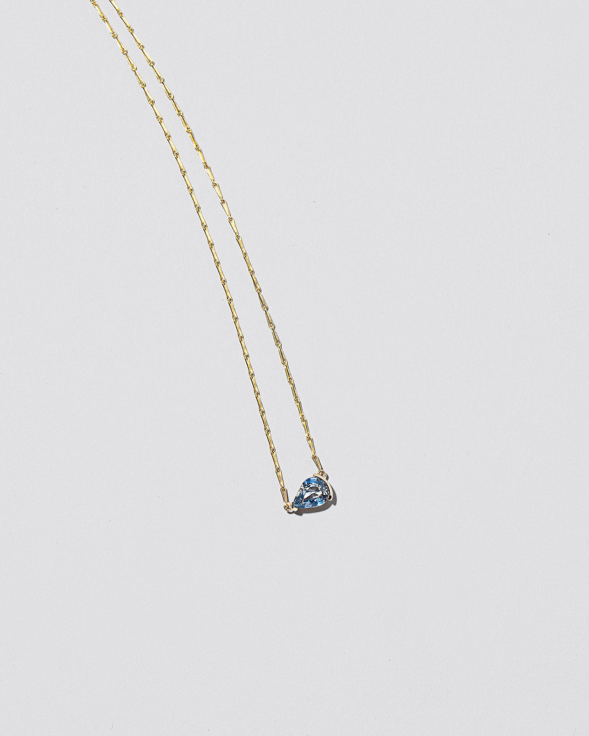  Say Yes Necklace on light color background.