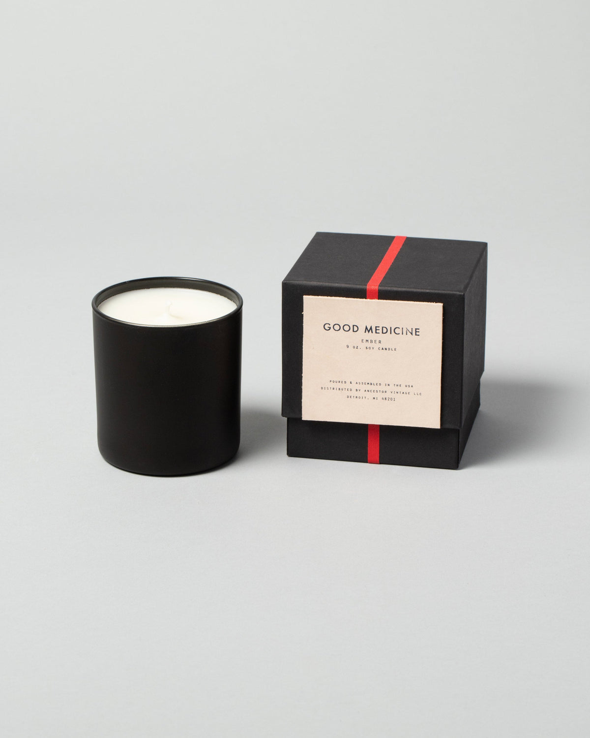 Good Medicine Candle on light color background.