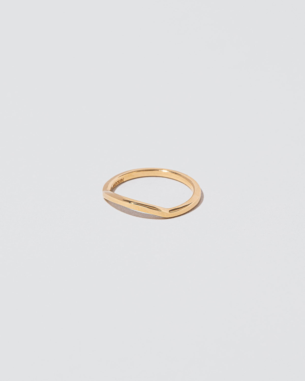 Gold Bow Band on light color background.