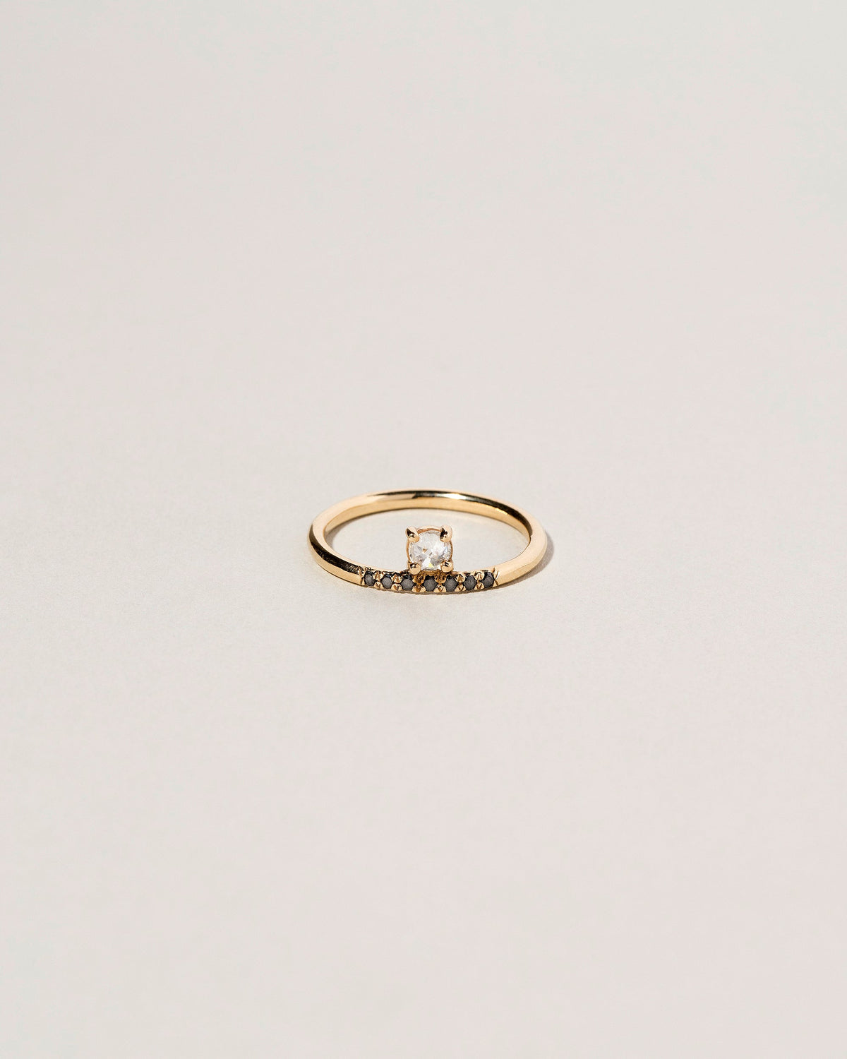  Stacked Ring - White & Black Diamond on light color background.