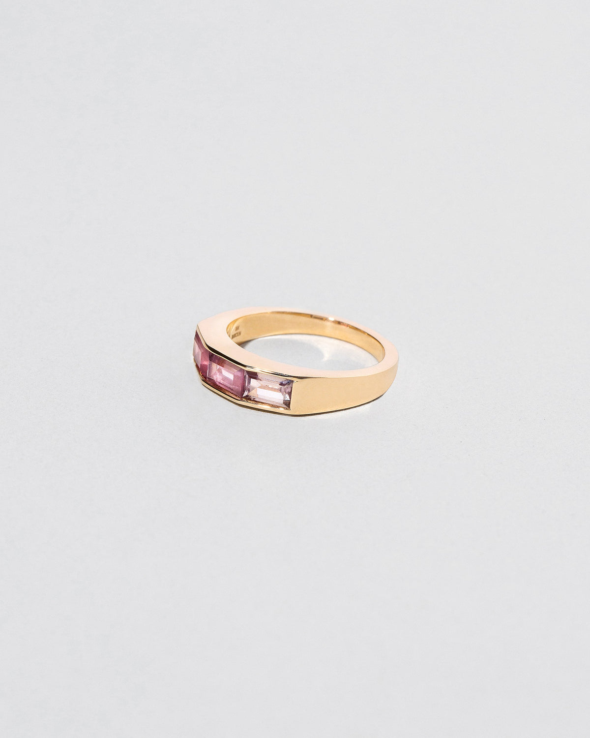  Amba Ring on light color background.