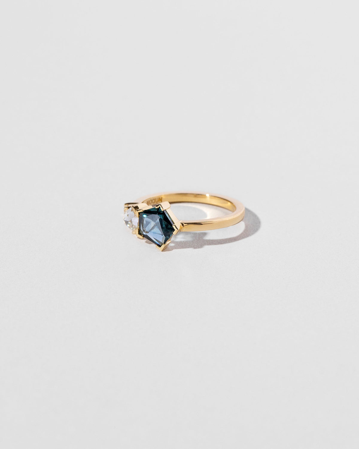  Caerus Ring on light color background.