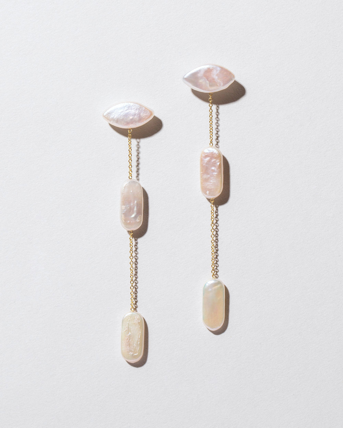 Candy Bar Pearl Drop Earrings on light color background.