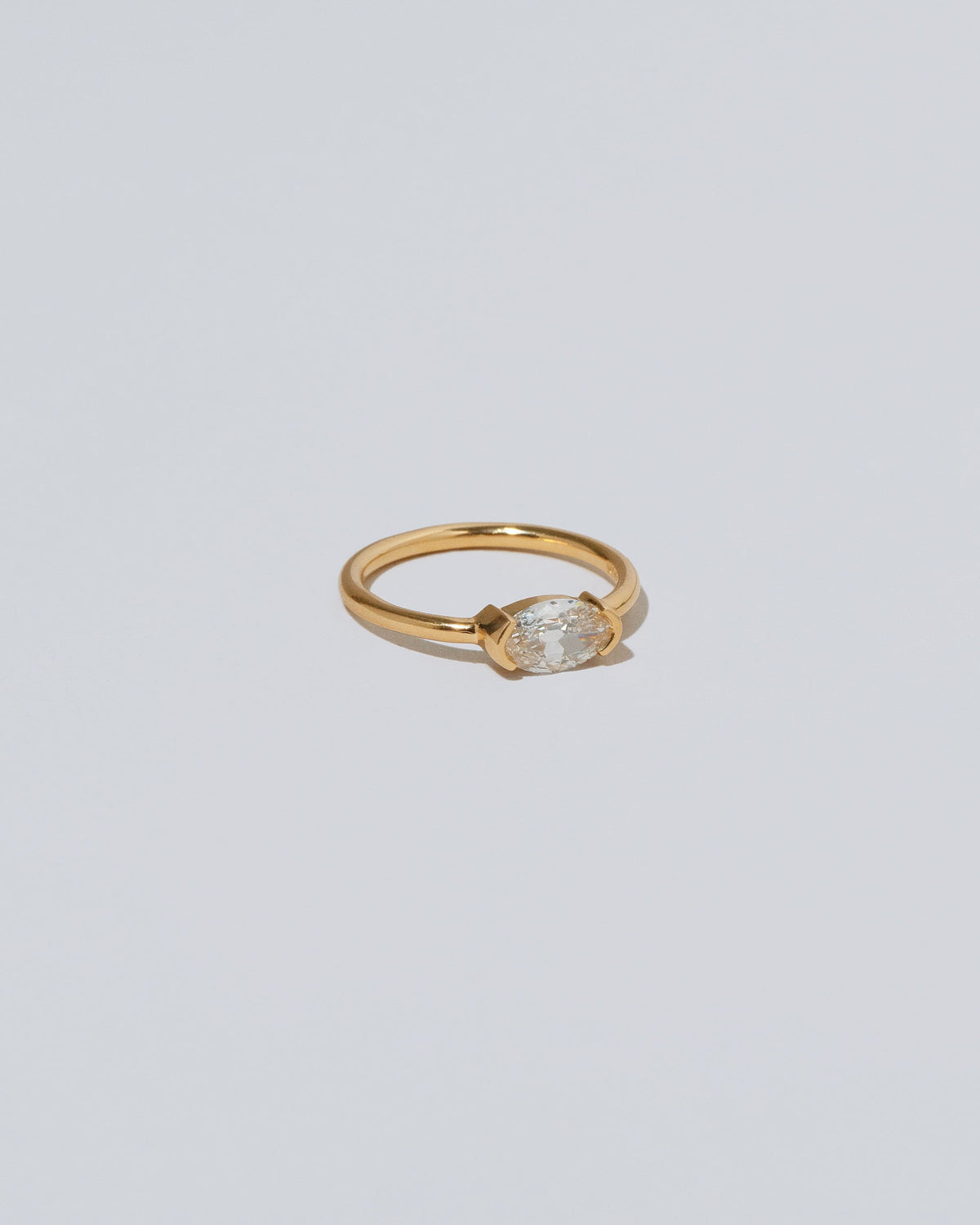 View from the side of the De Coté Ring on light color background.