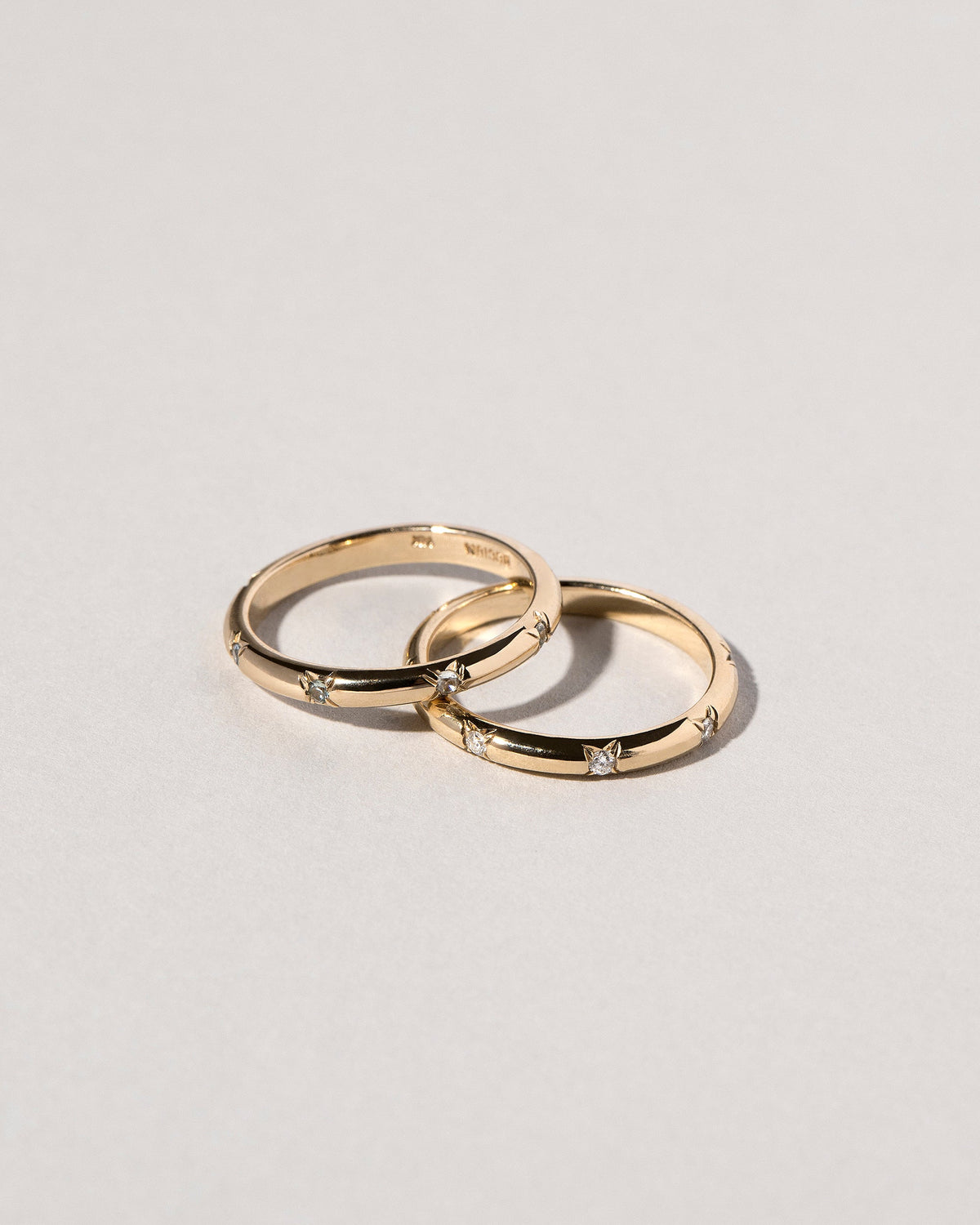 White Diamond Half Round Studded Bands on light color background.