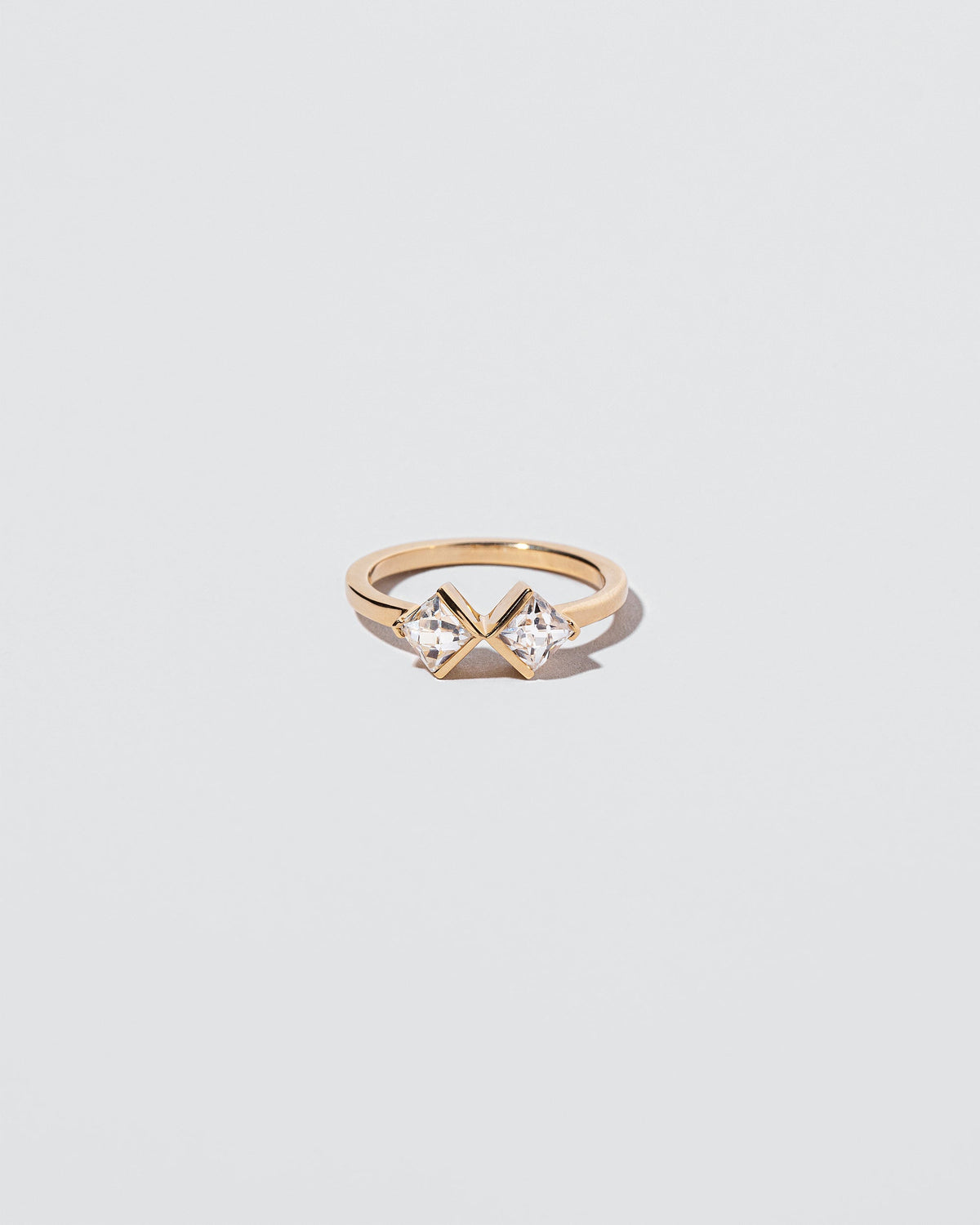  Rise & Fall Ring on light color background.