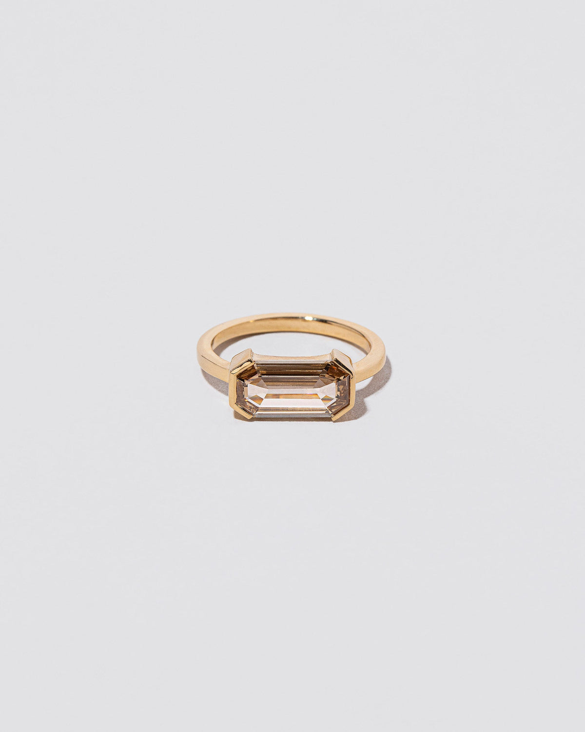 Book of Love Ring on light color background.