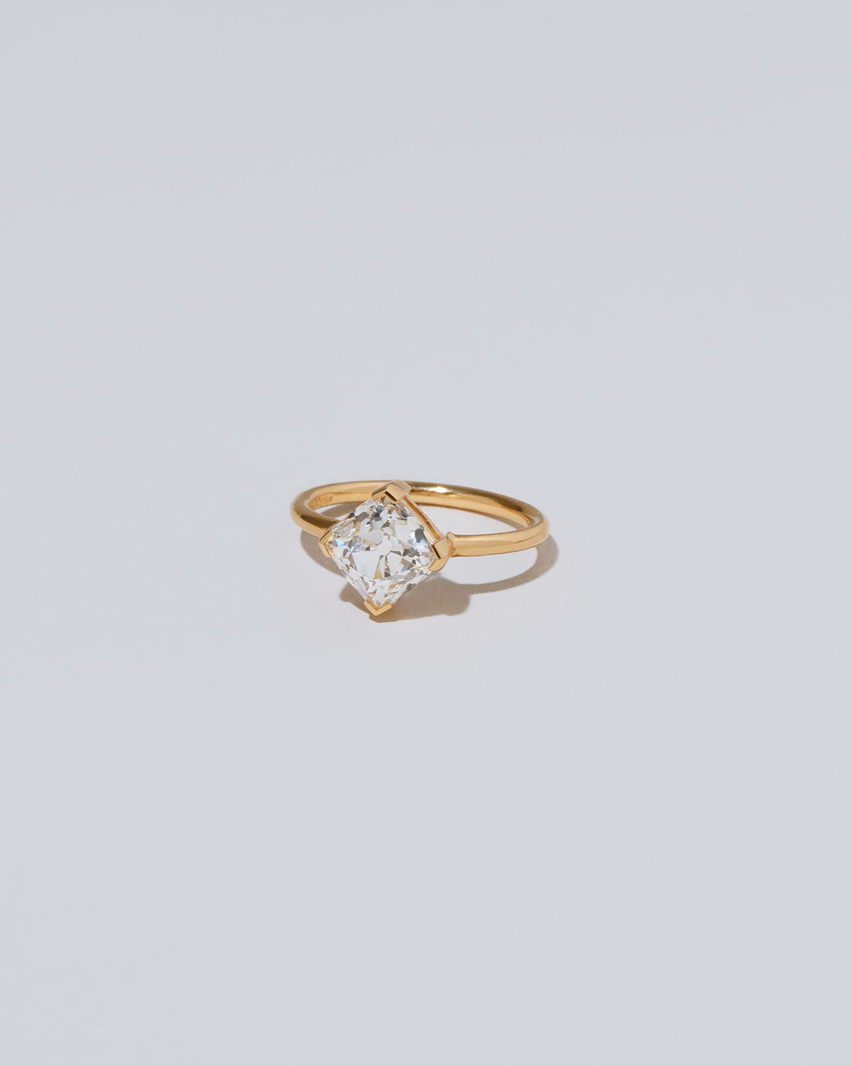 View from the side of the Sauté Ring on light color background.