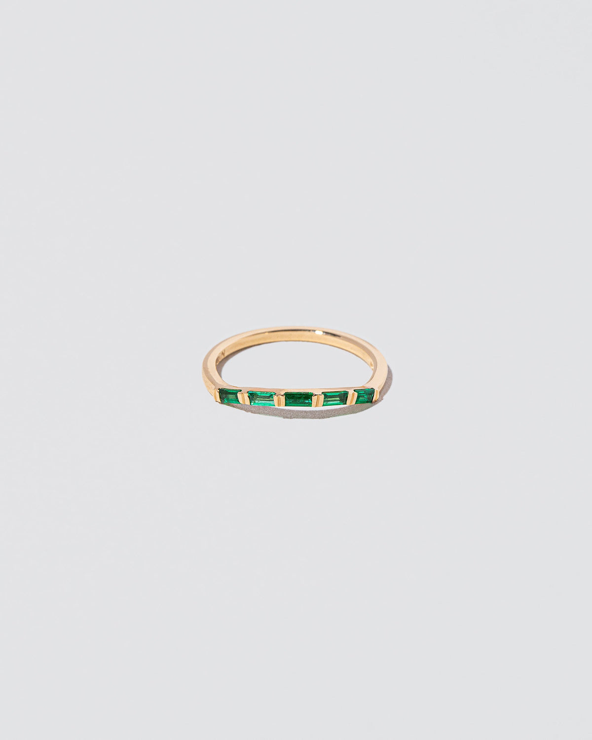 Emerald Bow Band on light color background.