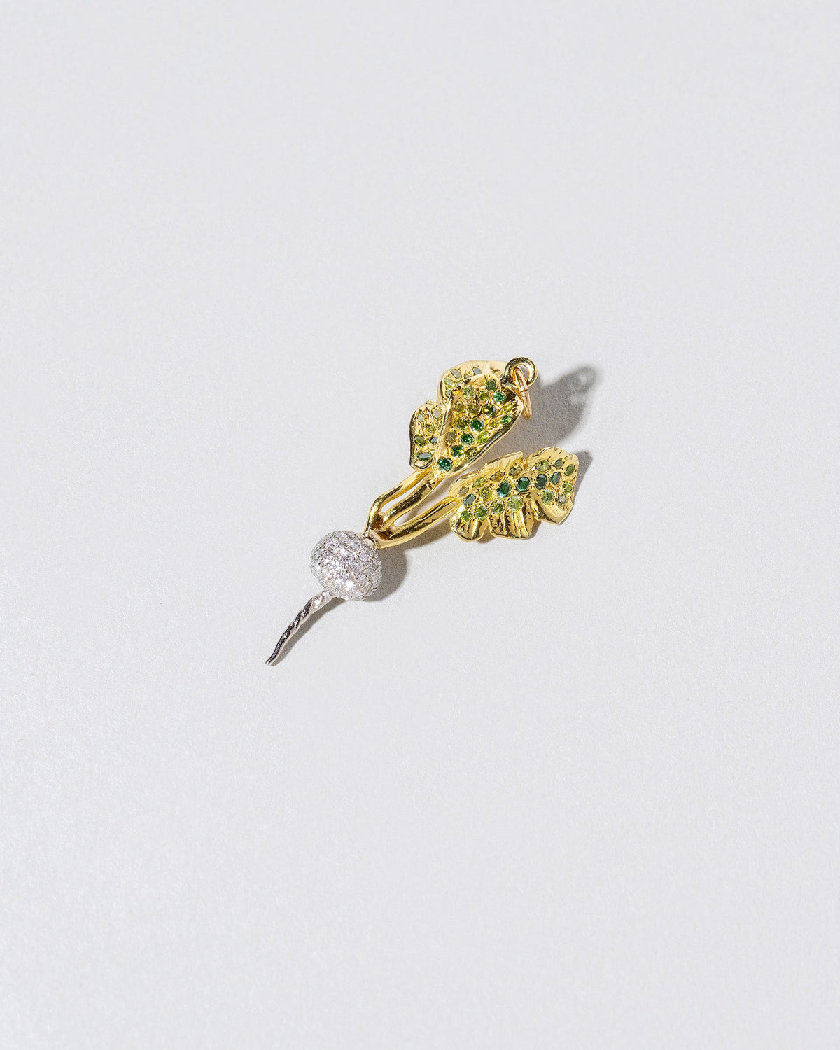  White Radish Charm on light color background.