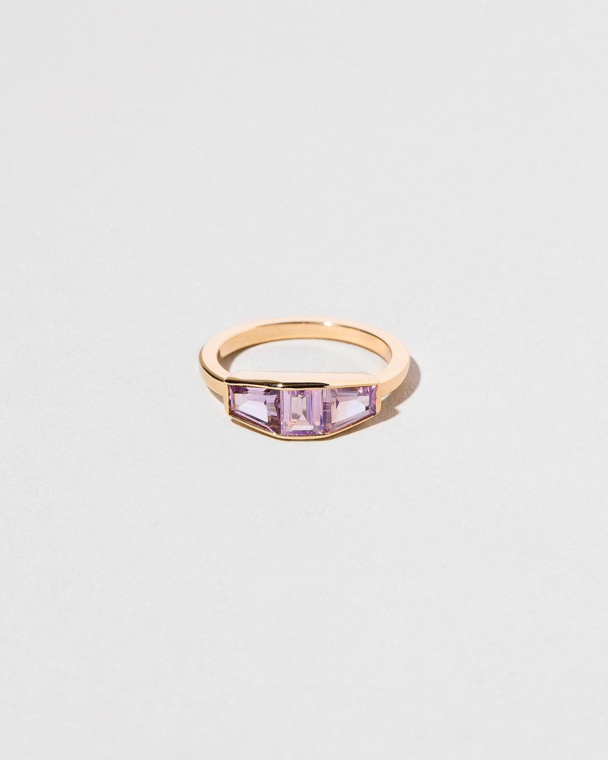  Dhatu Ring on light color background.