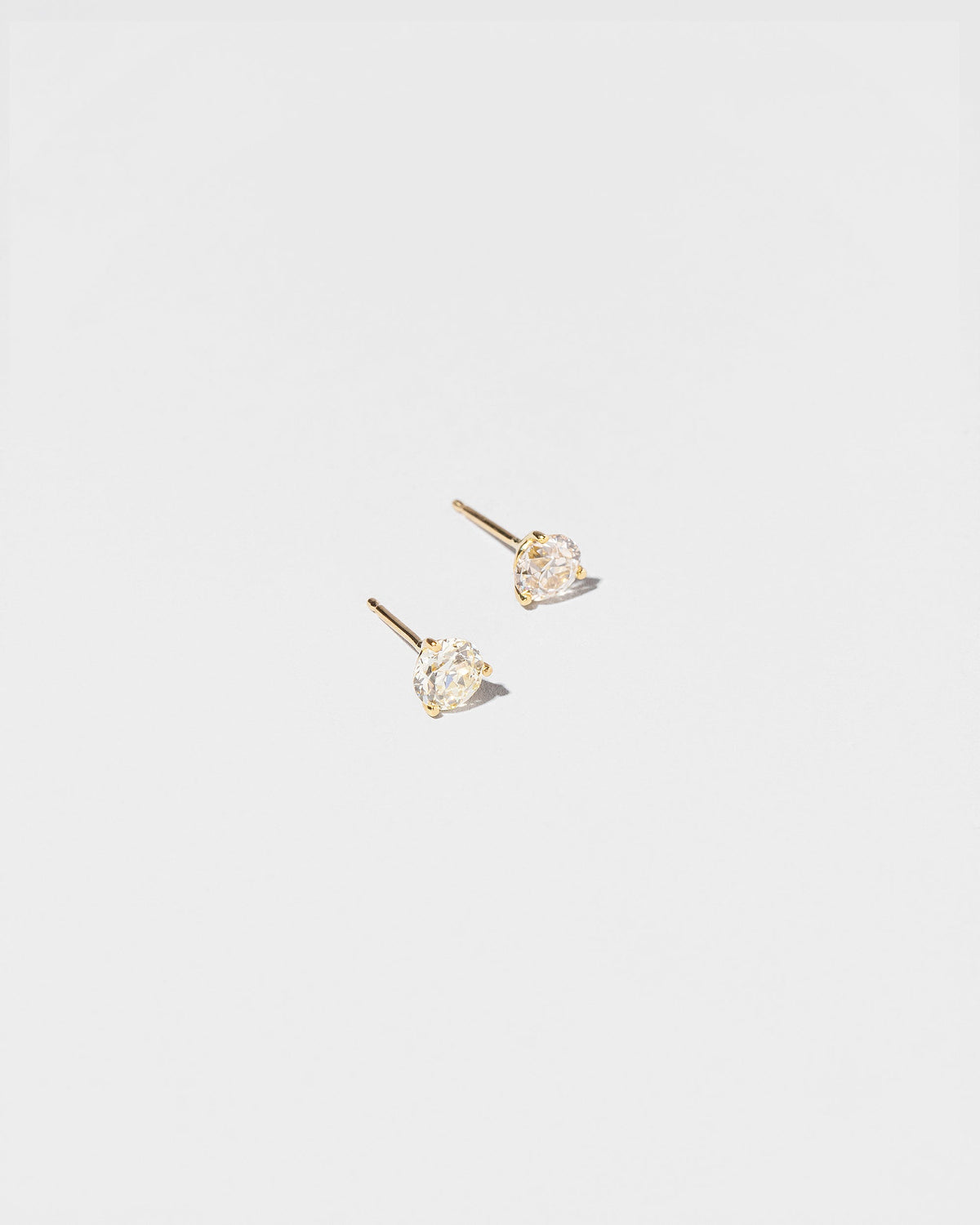  Martini Studs - White Diamond on light color background.