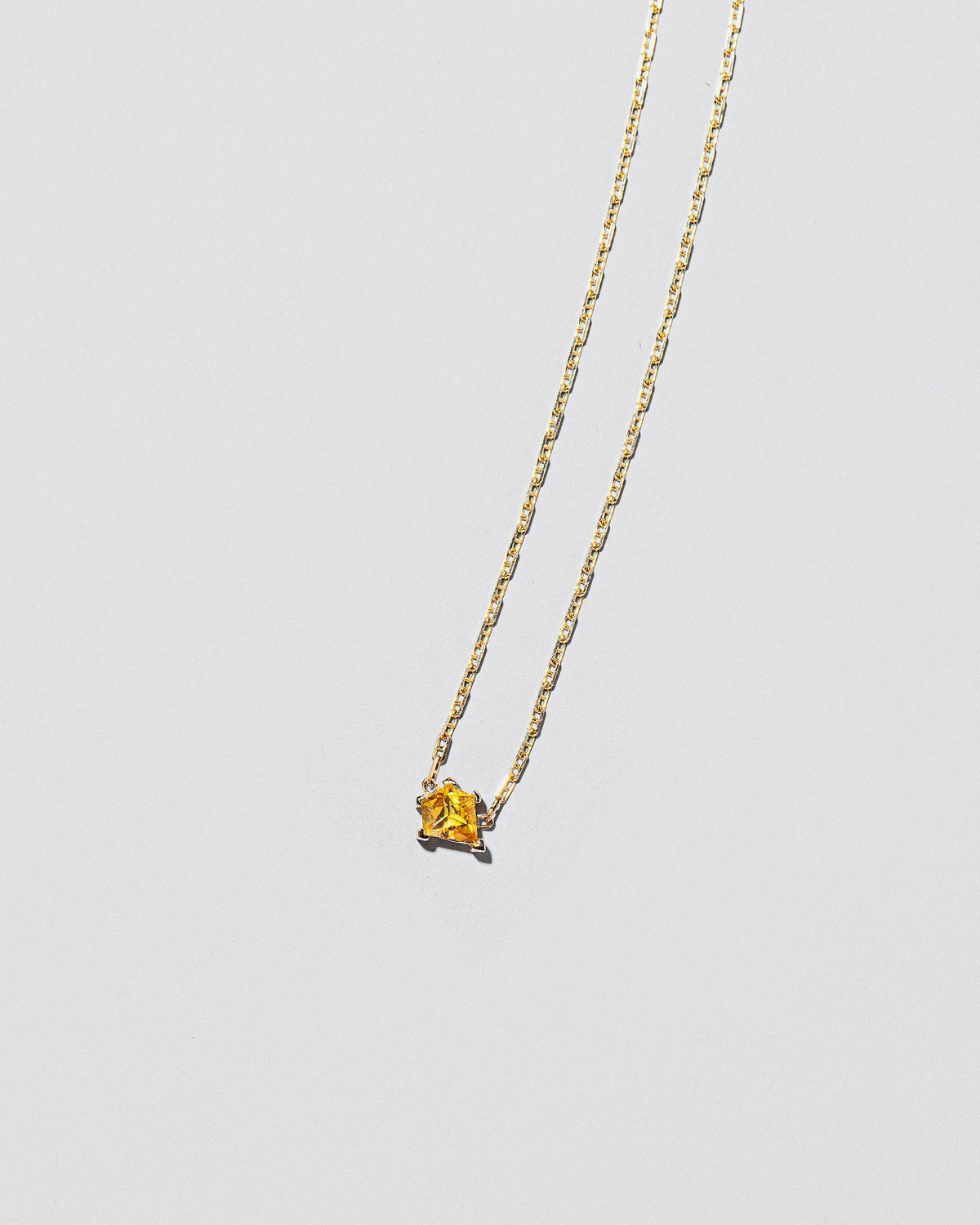  Be True Necklace on light color background.
