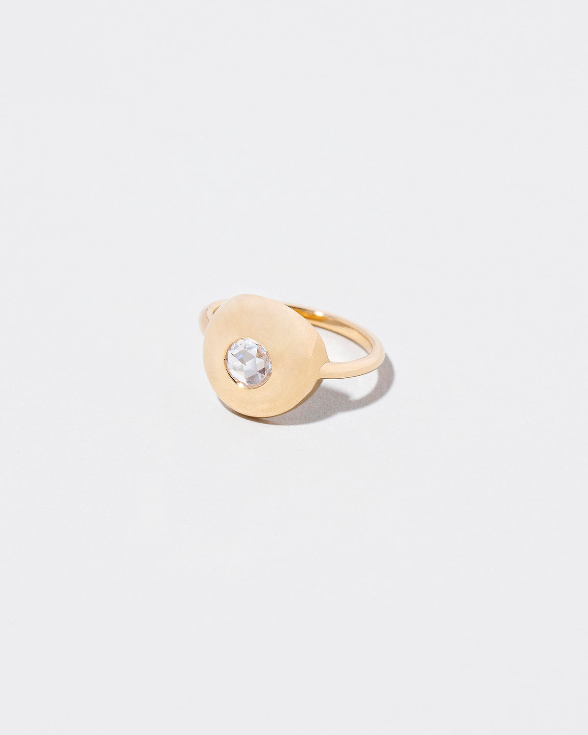  Petite Exposition Ring on light color background.