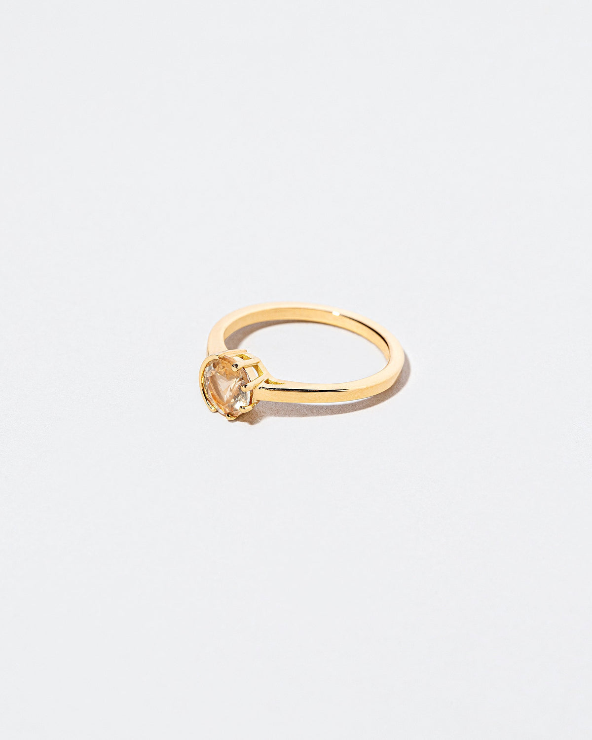  Sun & Moon Ring - Bicolor Yellow Sapphire on light color background.