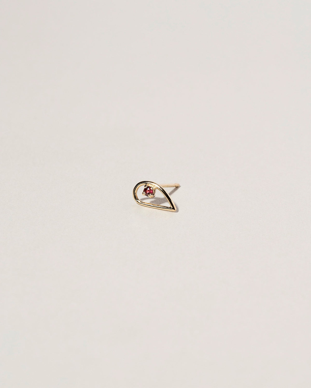 Sun Drop Single Stud on light color background.