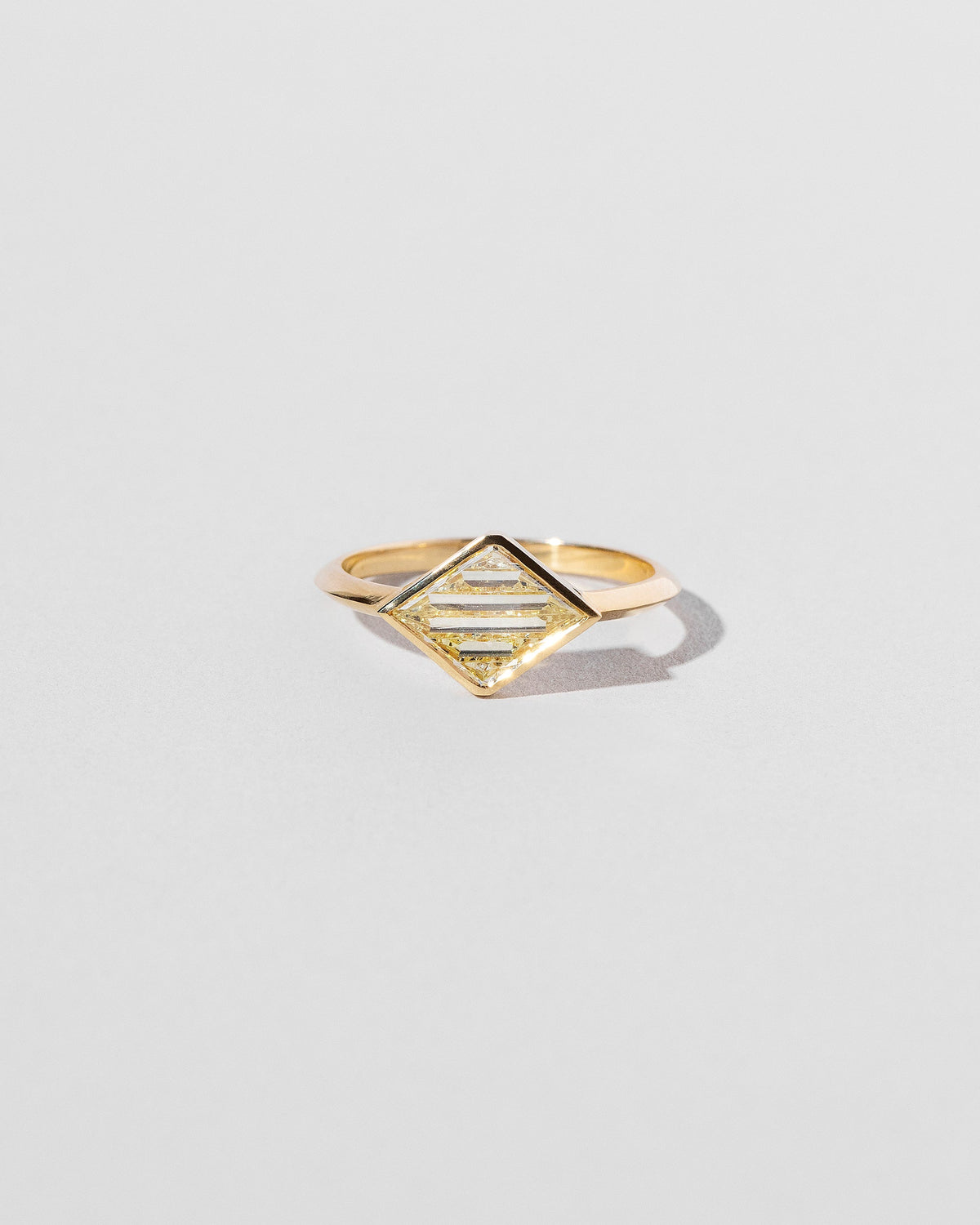 Aidos Ring on light color background.