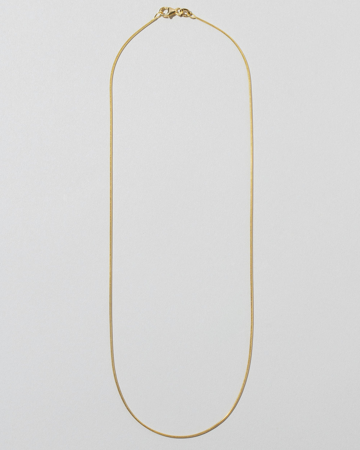 0.9mm Serpent Chain Necklace on light color background.