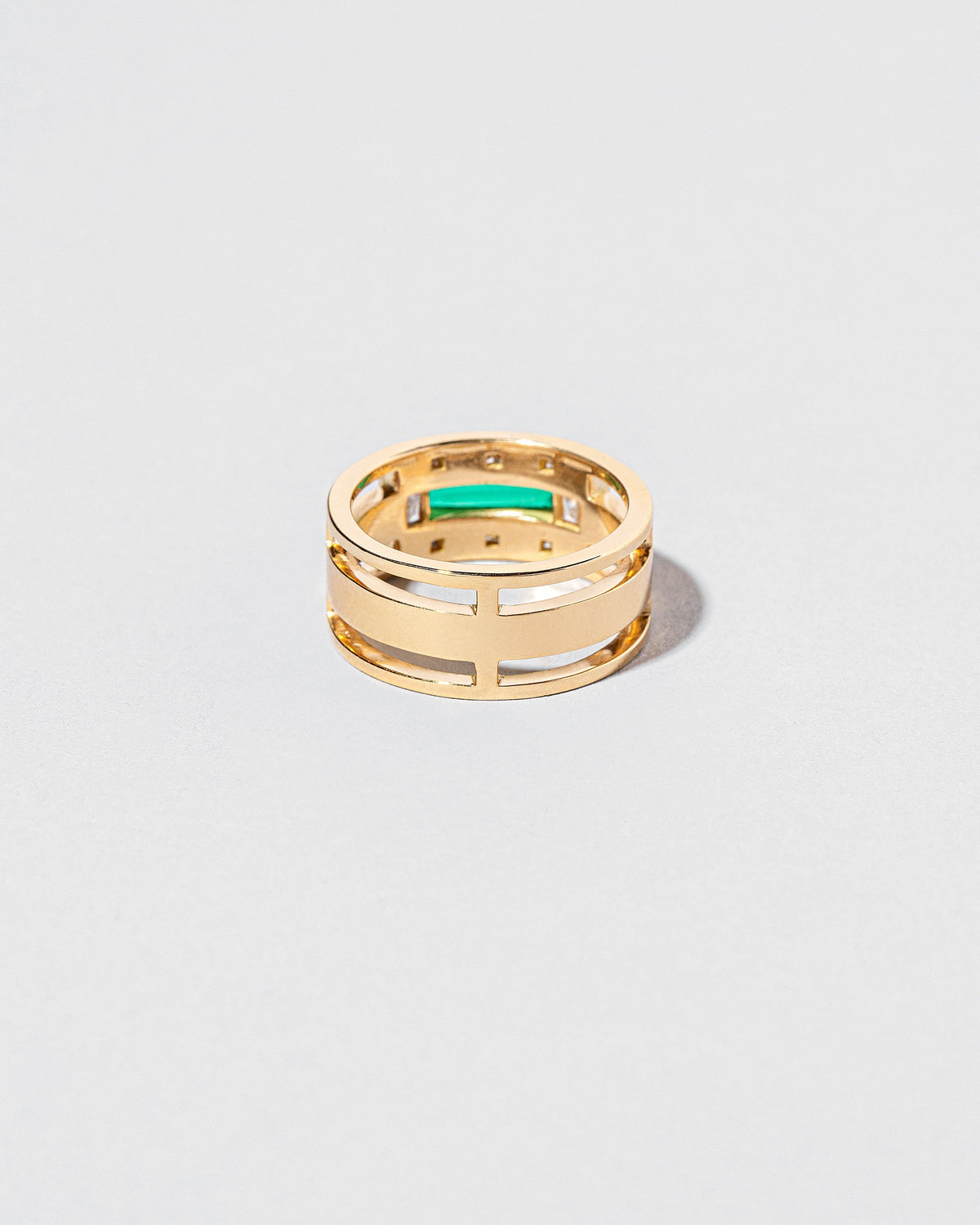  Sleeping Figure Ring on light color background.
