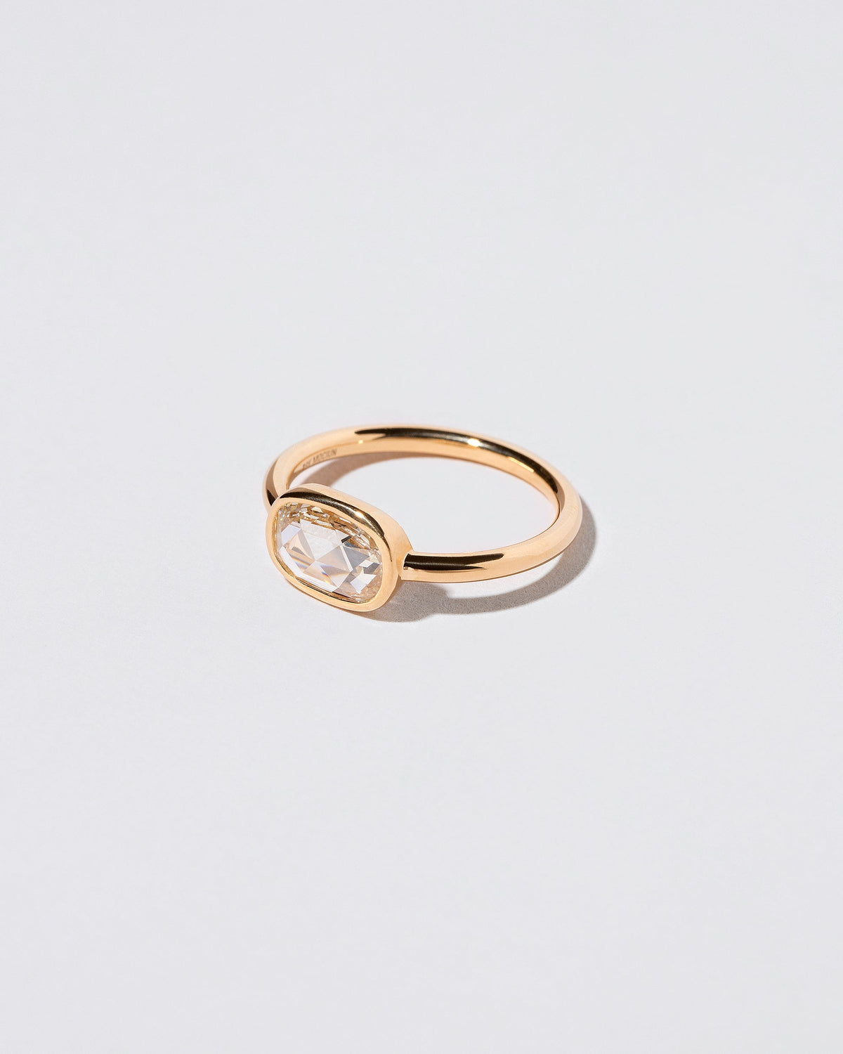 View from the side of the Apollo Ring on light color background.