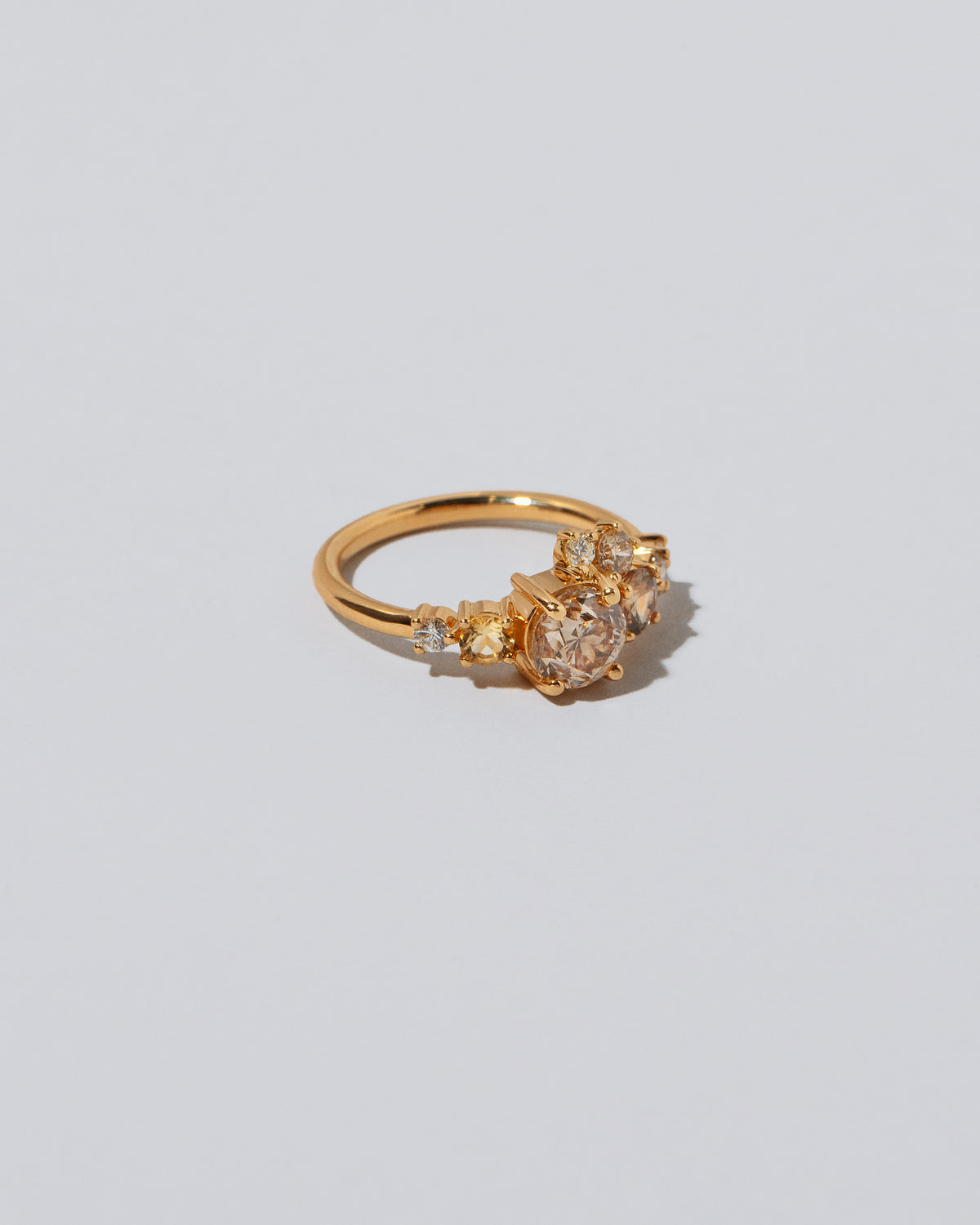 Product photo of Champagne Luna Ring on light color background. 