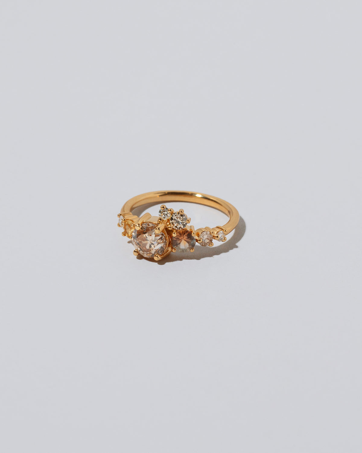 Product photo of Champagne Luna Ring on light color background. 