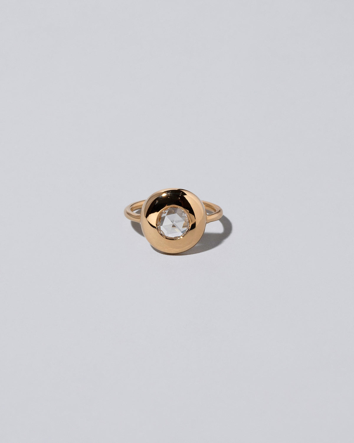Exposition Ring on light colored background.
