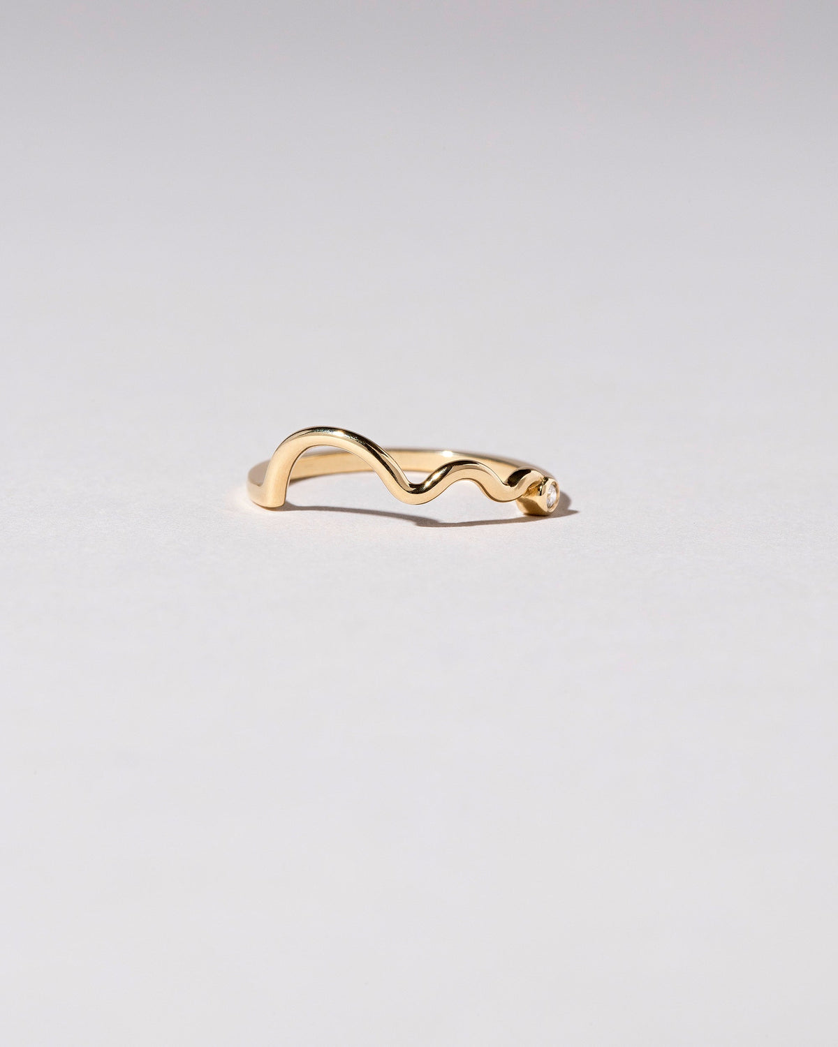  Squiggle Band - Bezel on light color background.