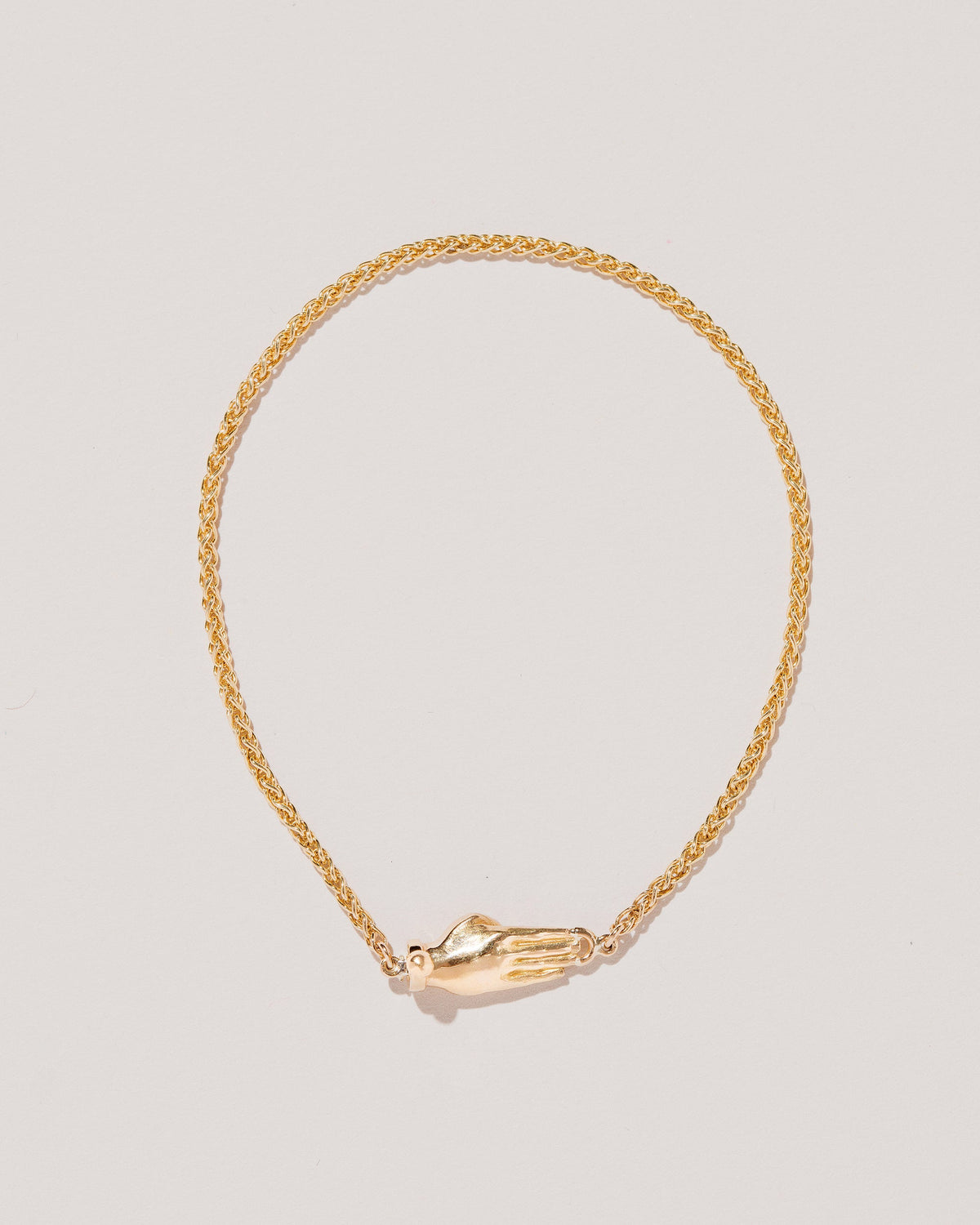  Manifestation Bracelet on light color background.