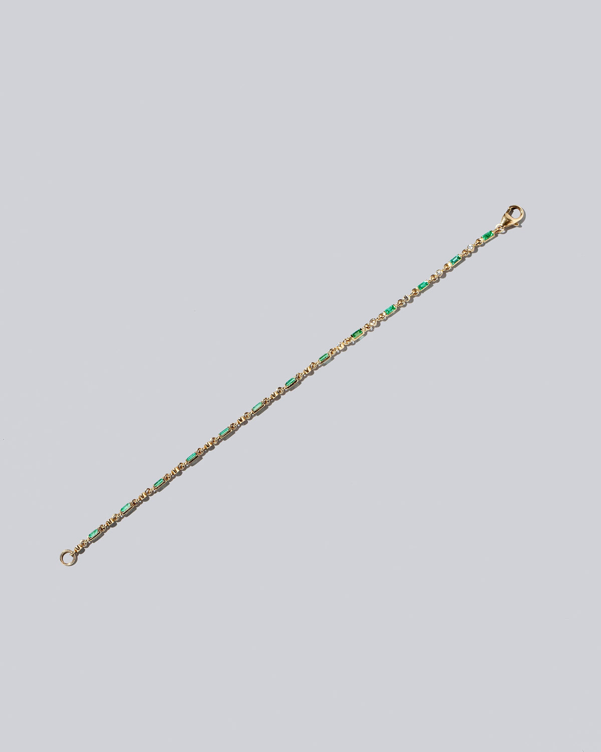 Emerald Full Building Blocks Bracelet on light color background.
