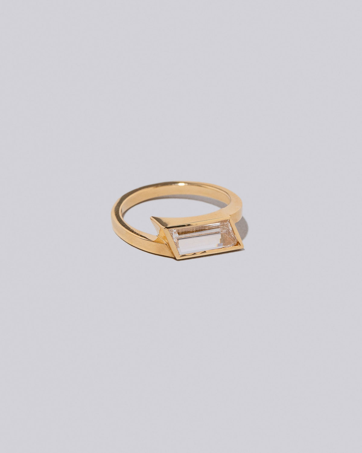 View from the side of the Melody Ring on light color background.