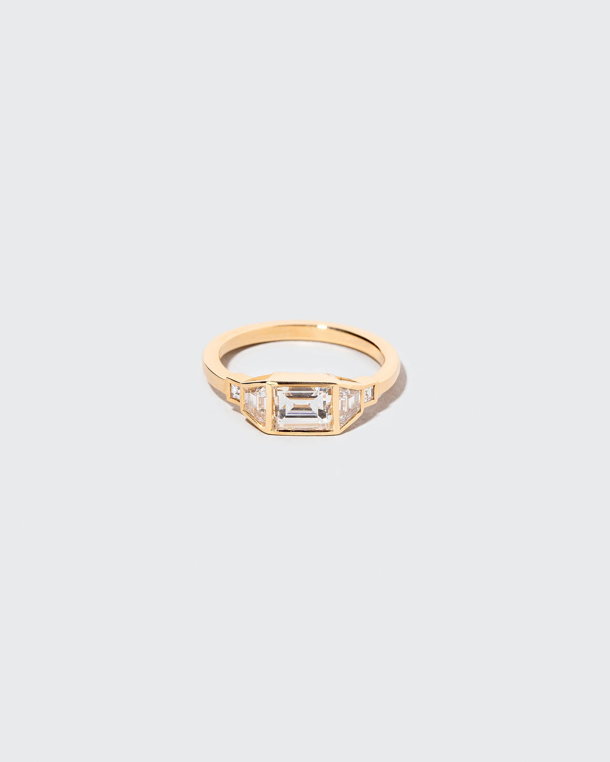 Venus Carré Ring on light color background.