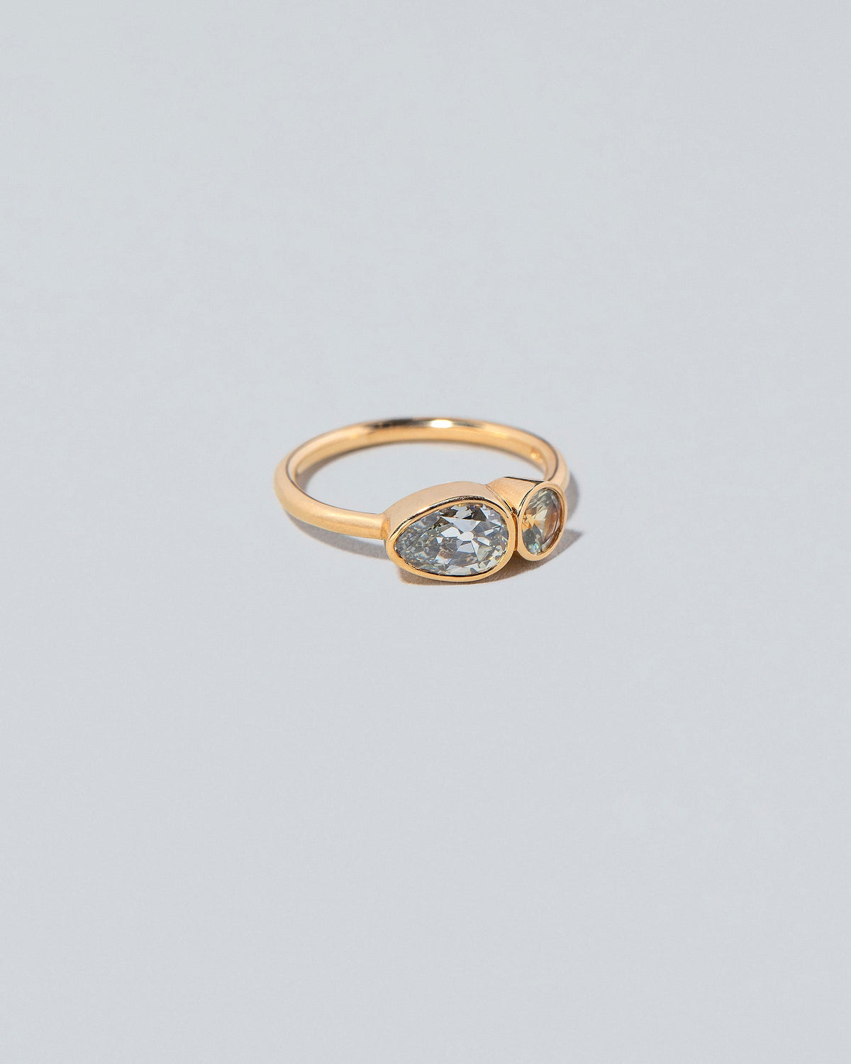  Assal Ring on light color background.