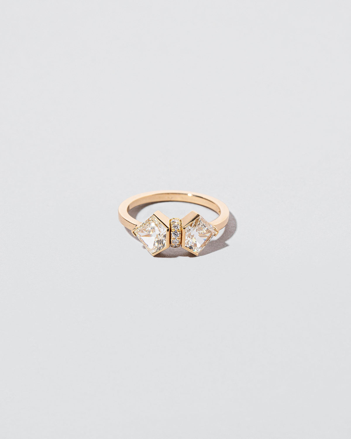 Alchemy Ring on light color background.