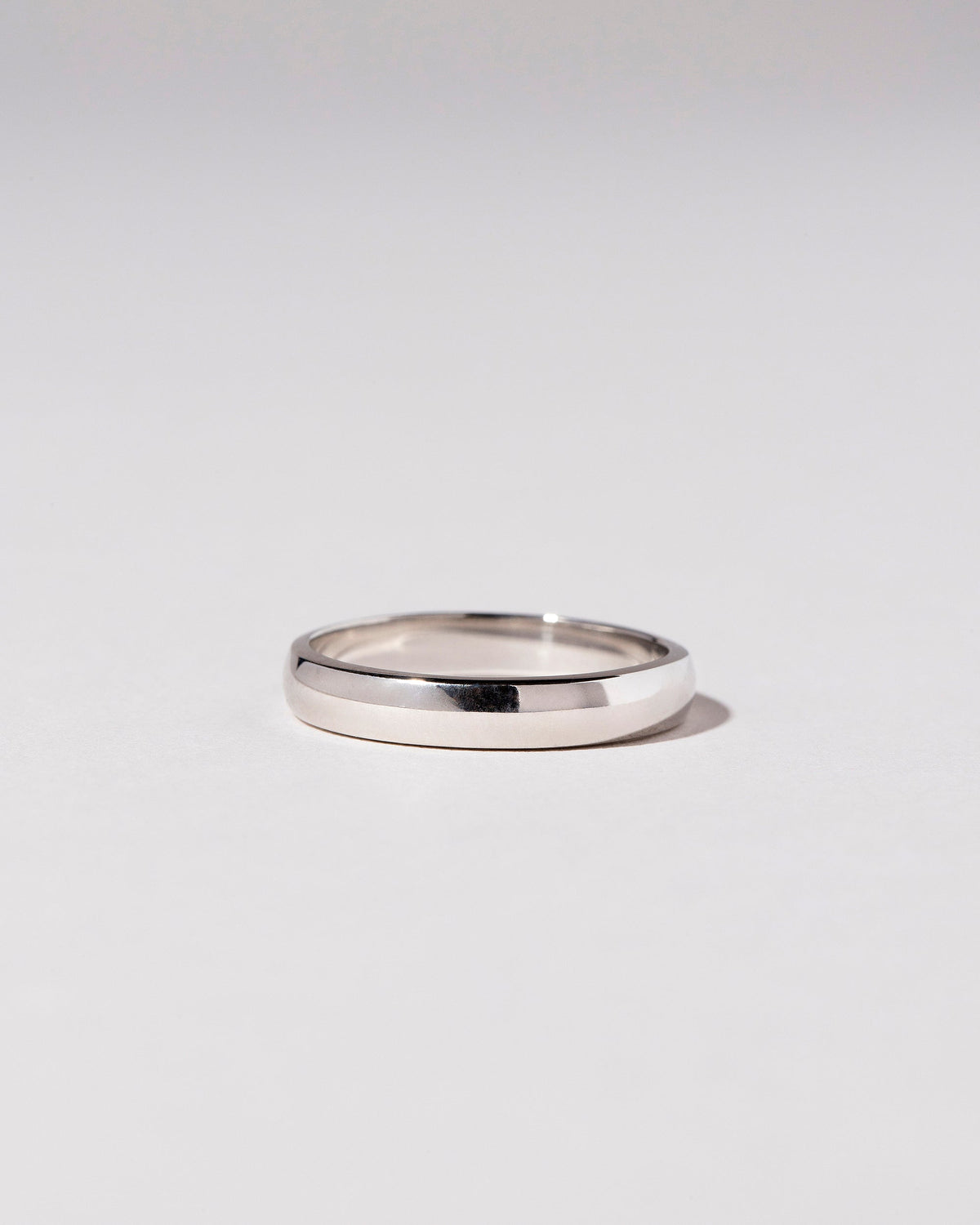 Platinum 3mm Half Round Band on light color background.