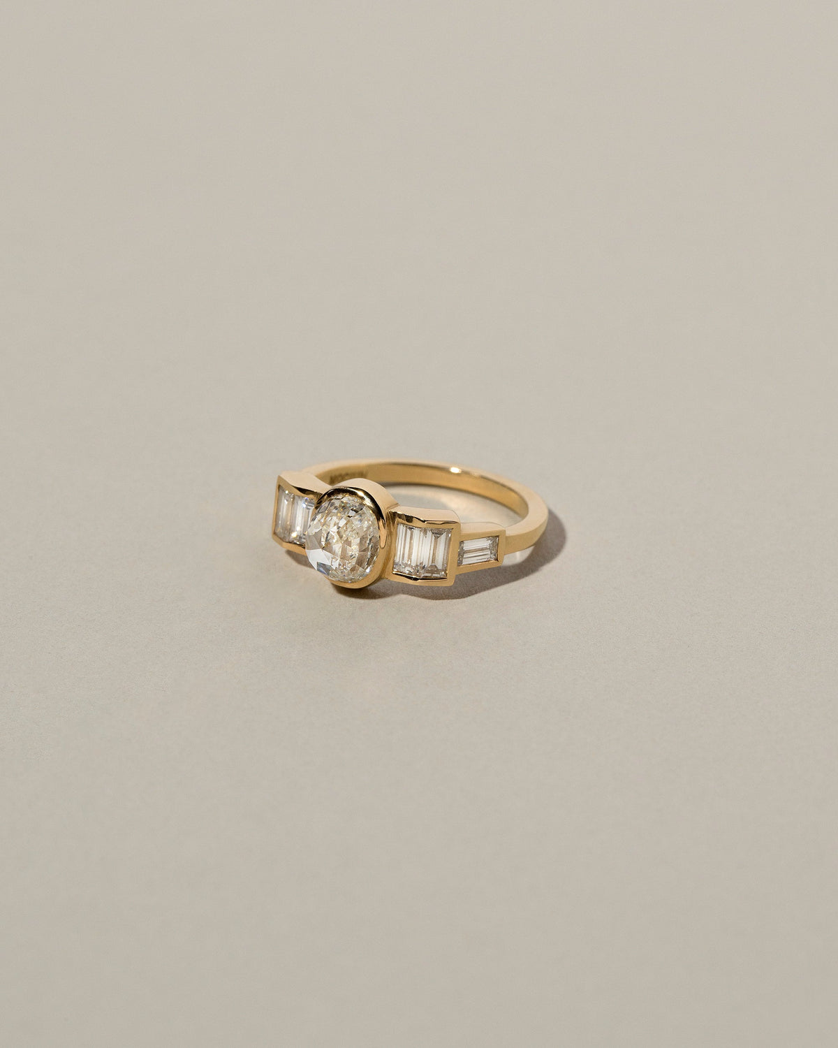  Modified Brilliant Diamond Ring on light color background.