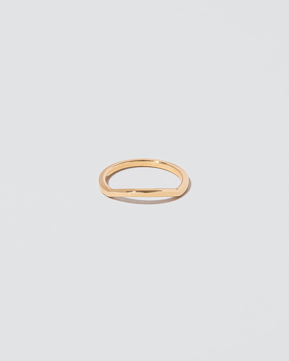 Gold Bow Band on light color background.