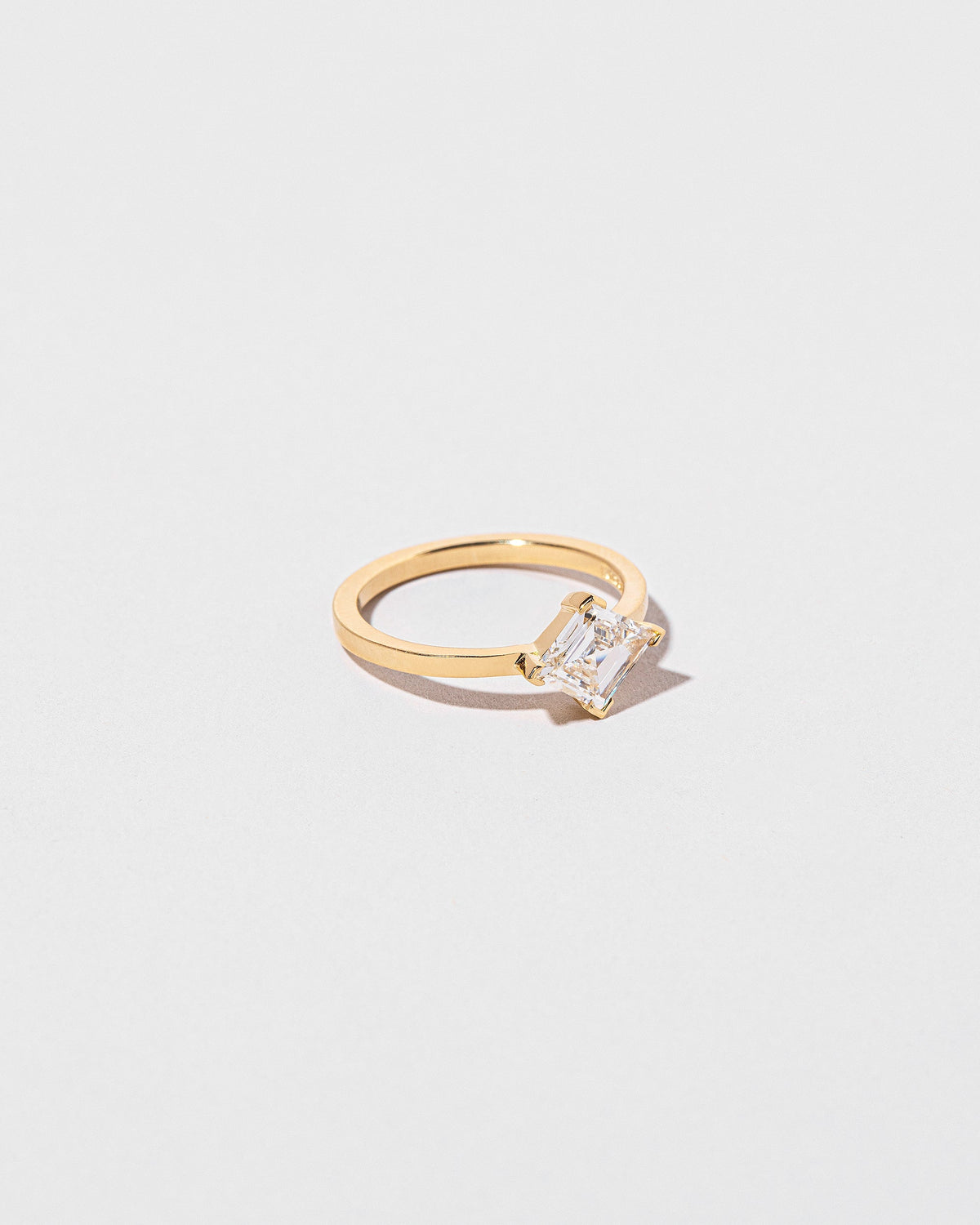 View from the side of the Paradox Ring on light color background.