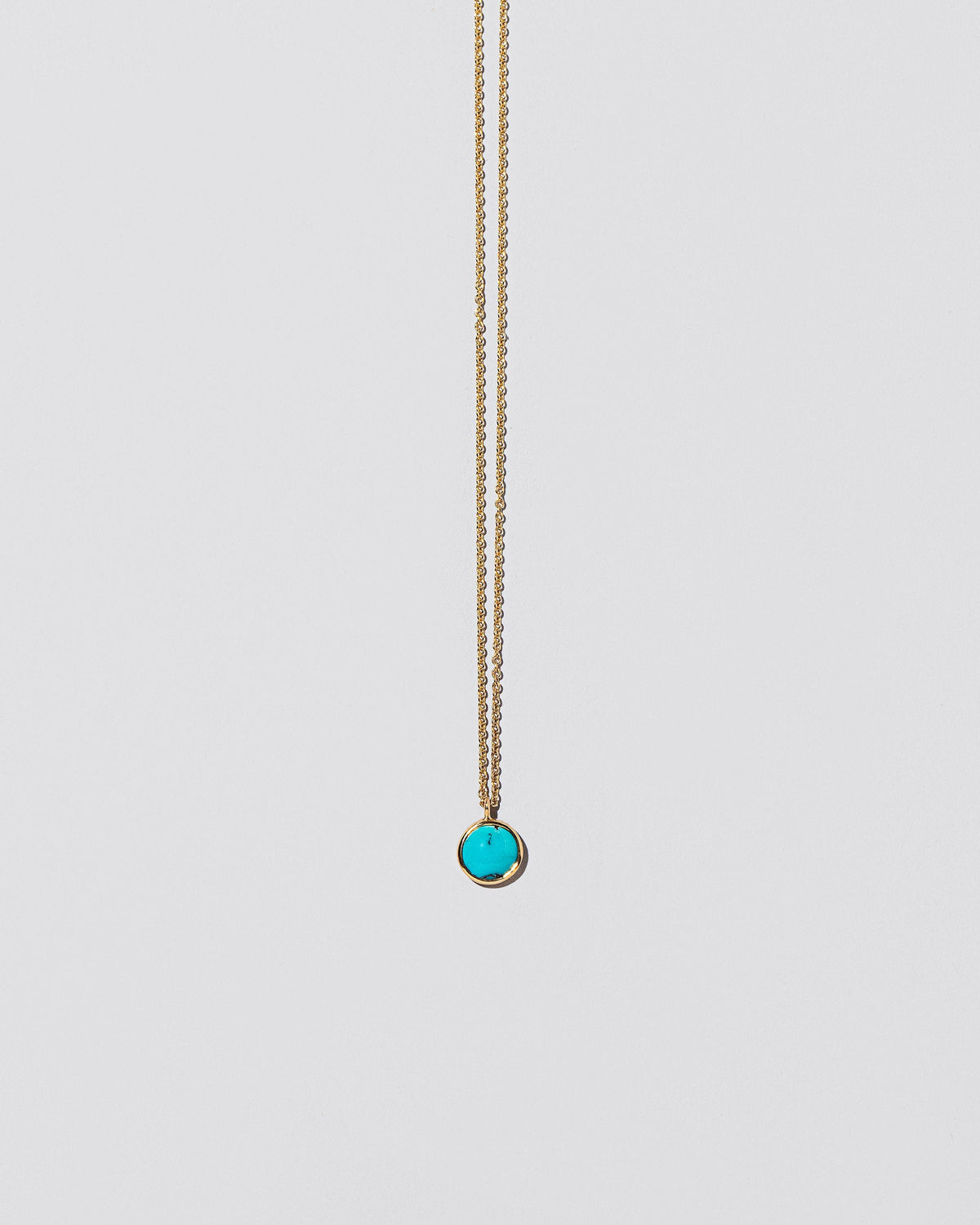 Wisdom Necklace on light color background.