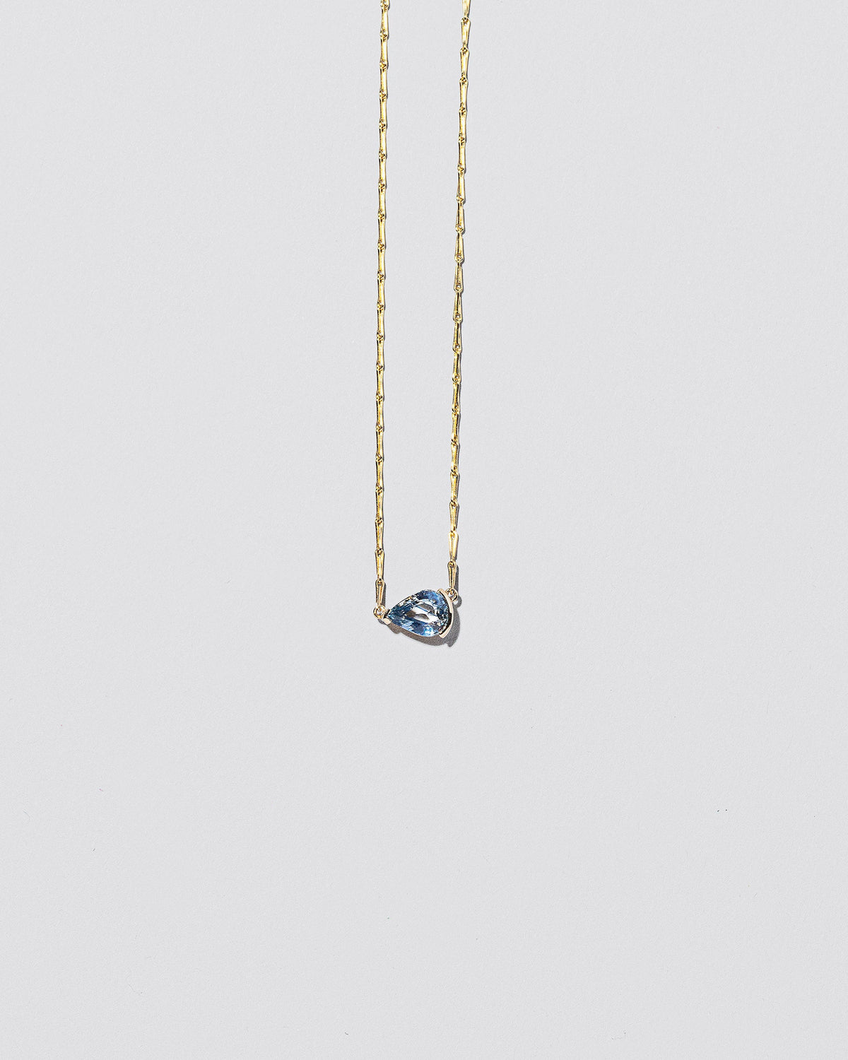  Say Yes Necklace on light color background.