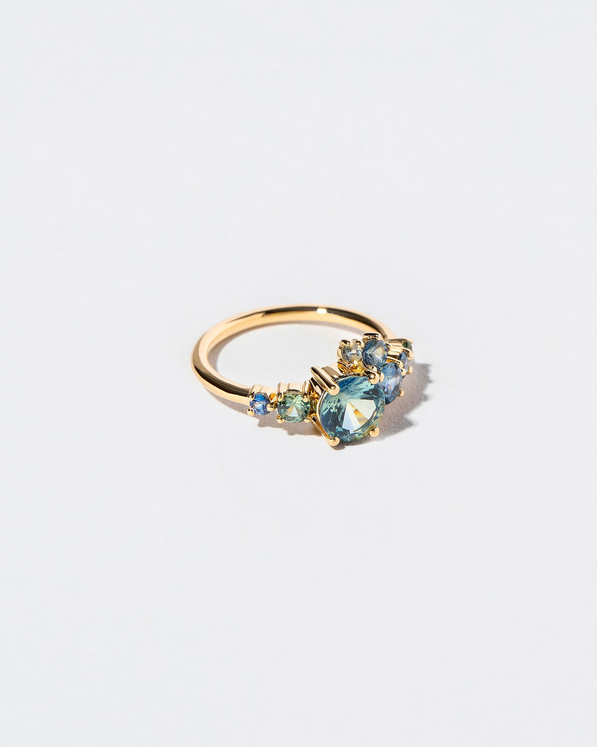  Luna Ring - Bicolor Sapphire on light color background.