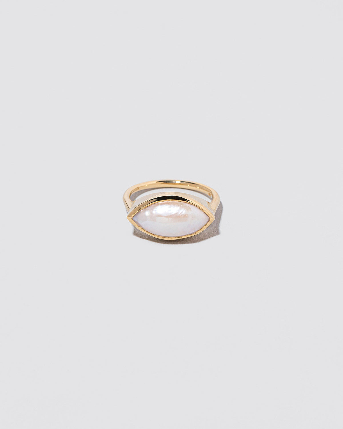 Triton Ring on light color background.