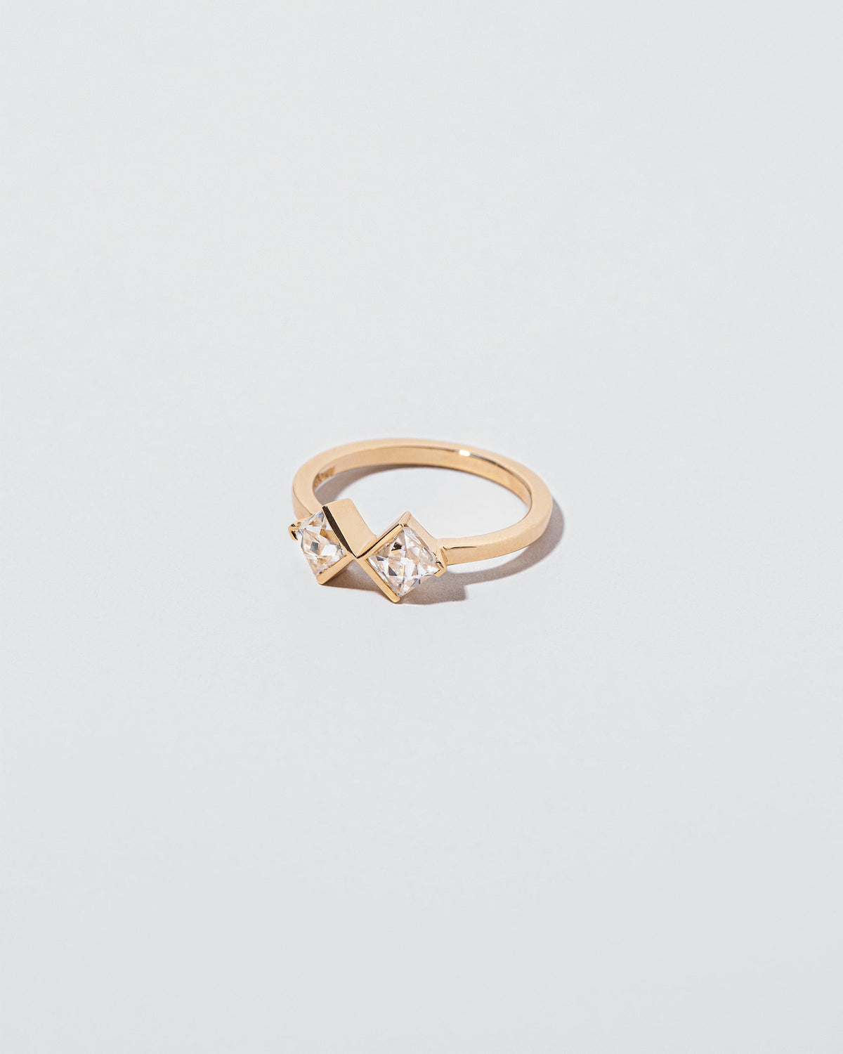  Rise & Fall Ring on light color background.