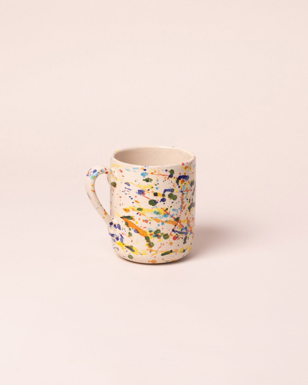 La Ceramica Vincenzo Del Monaco Colored Drops Coffee Mug on light color background.